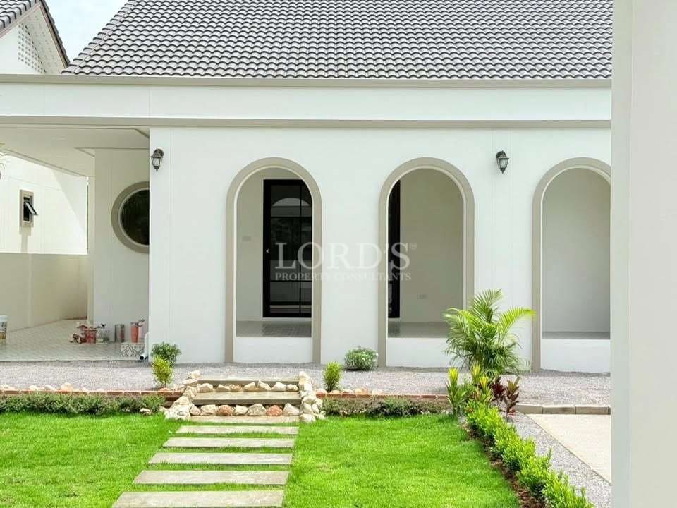 Modern white house with garden