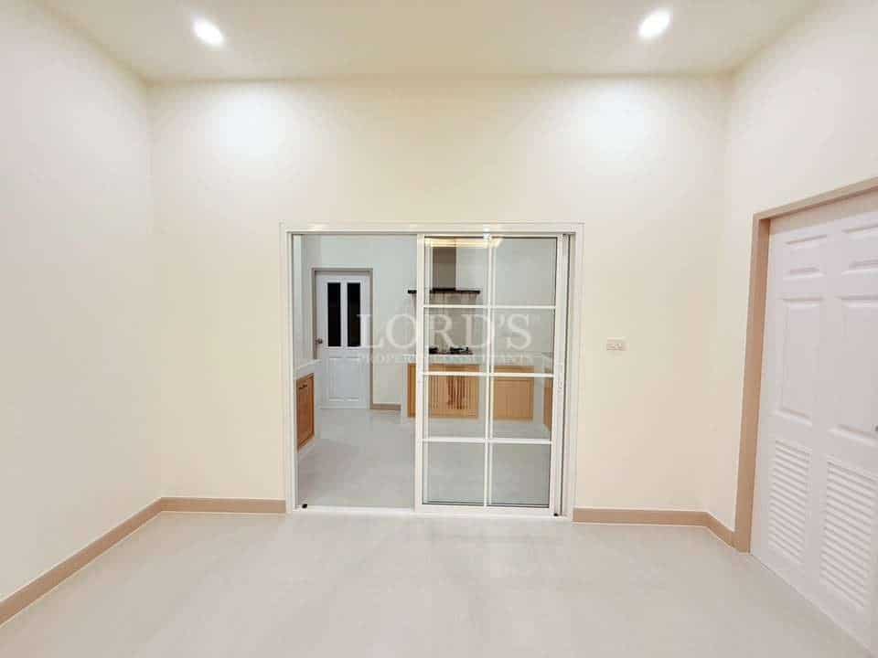 Empty room with sliding glass doors