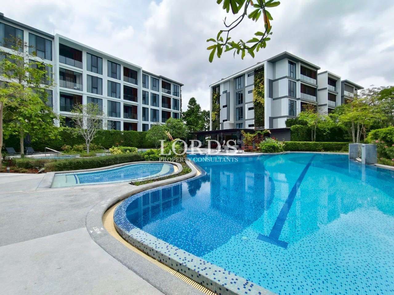 Modern poolside with residential buildings