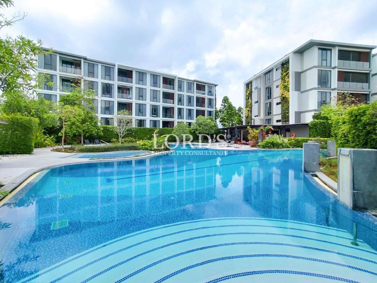 Modern apartment complex with pool