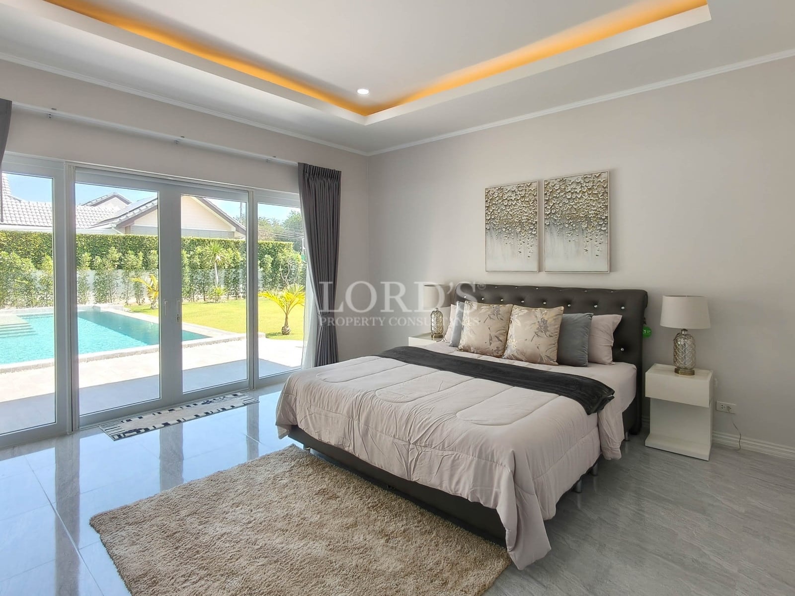 Modern bedroom with pool view